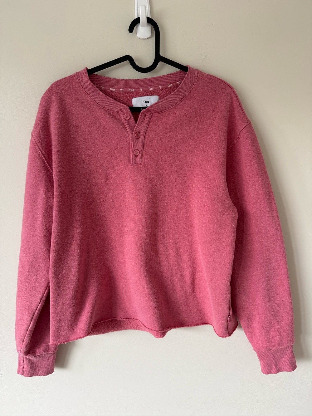21. TNA Rose Henley Crewneck Sweatshirt